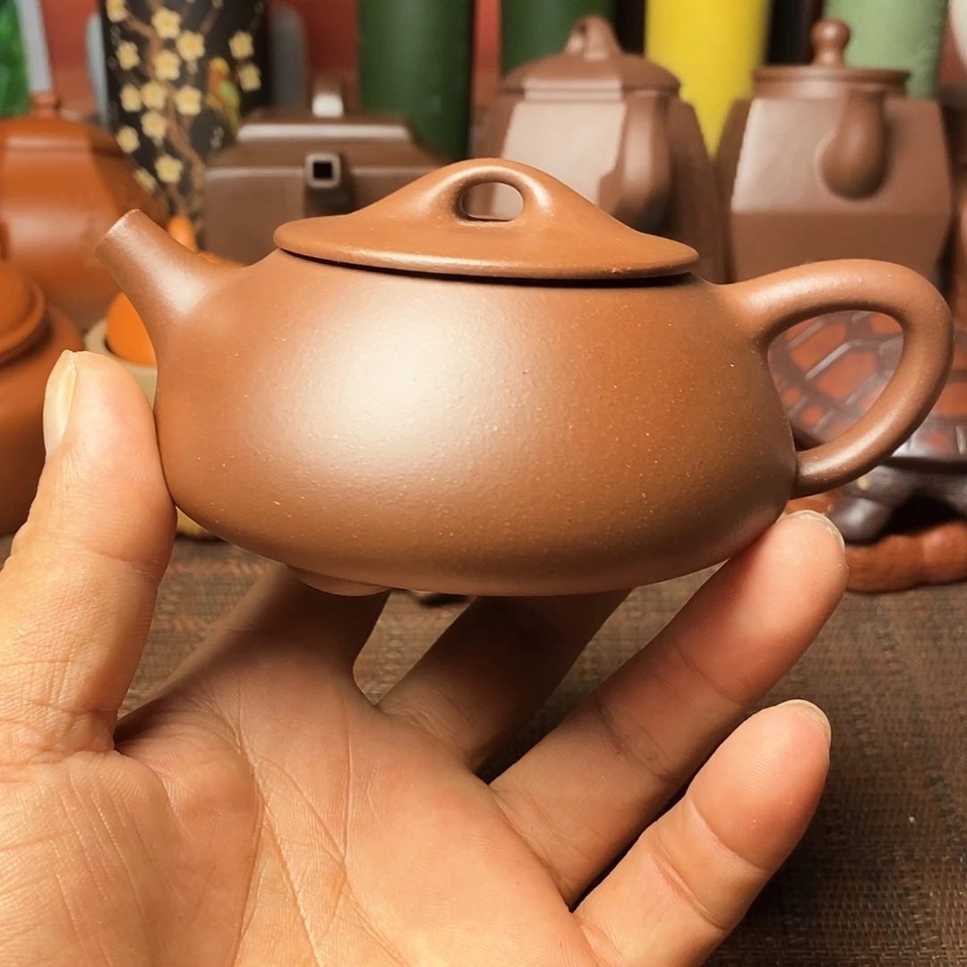 茶杯紫砂1357899987644