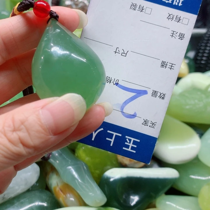 未镶嵌蛇纹石玉手把件