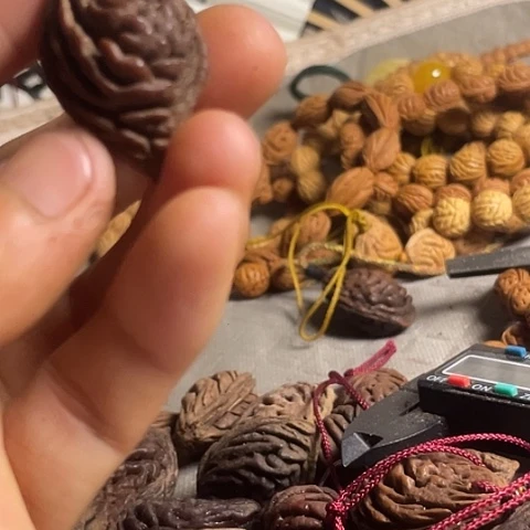 妞***妞碧桃核肌肉吊坠单