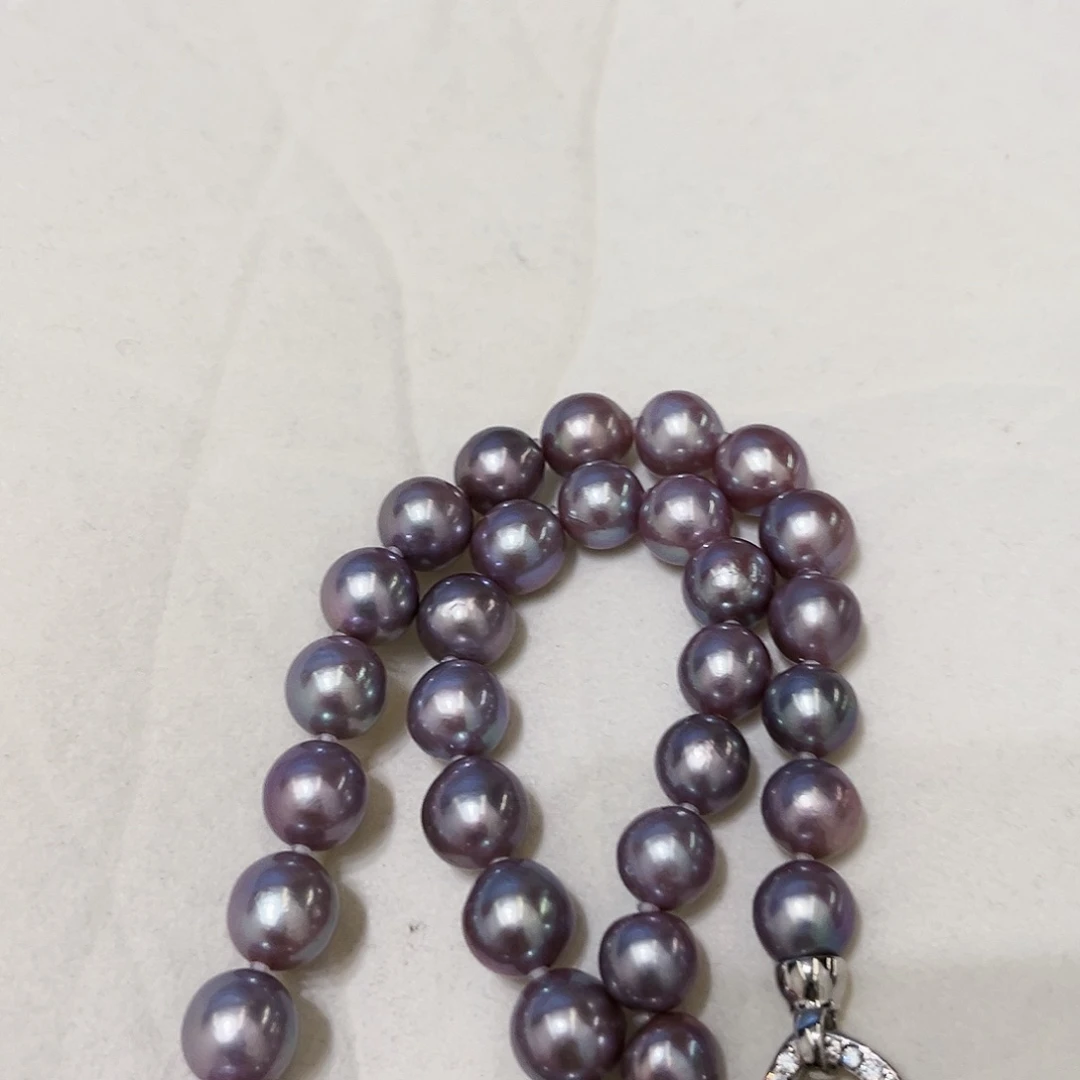 淡水珍珠颈饰银S925镶嵌挽**。