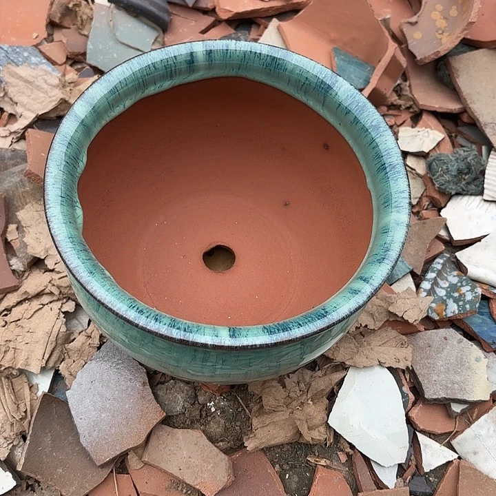 正品紫砂口18高12瑕疵。。。。。