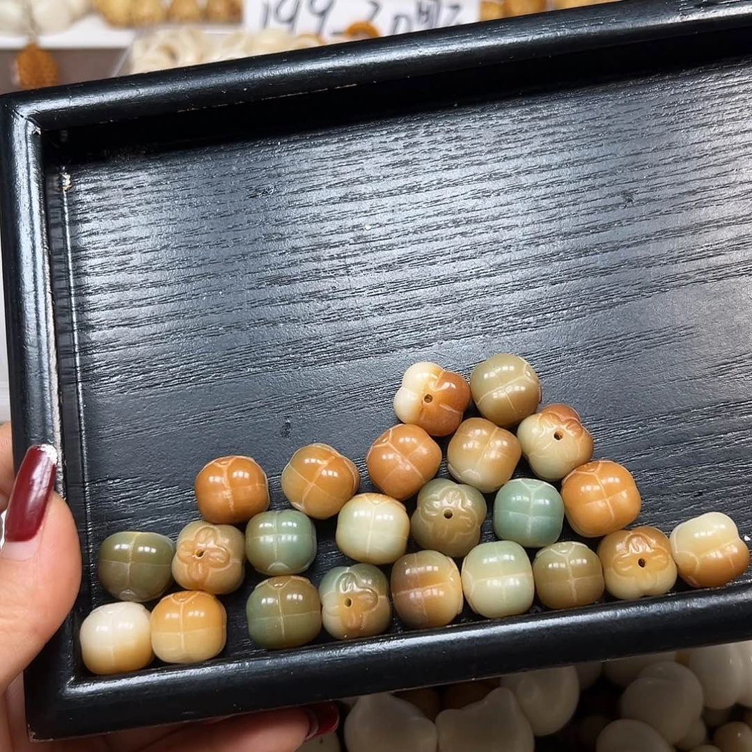 人***石手串菩提根/象牙果瑕疵敦煌柿子23颗有裂