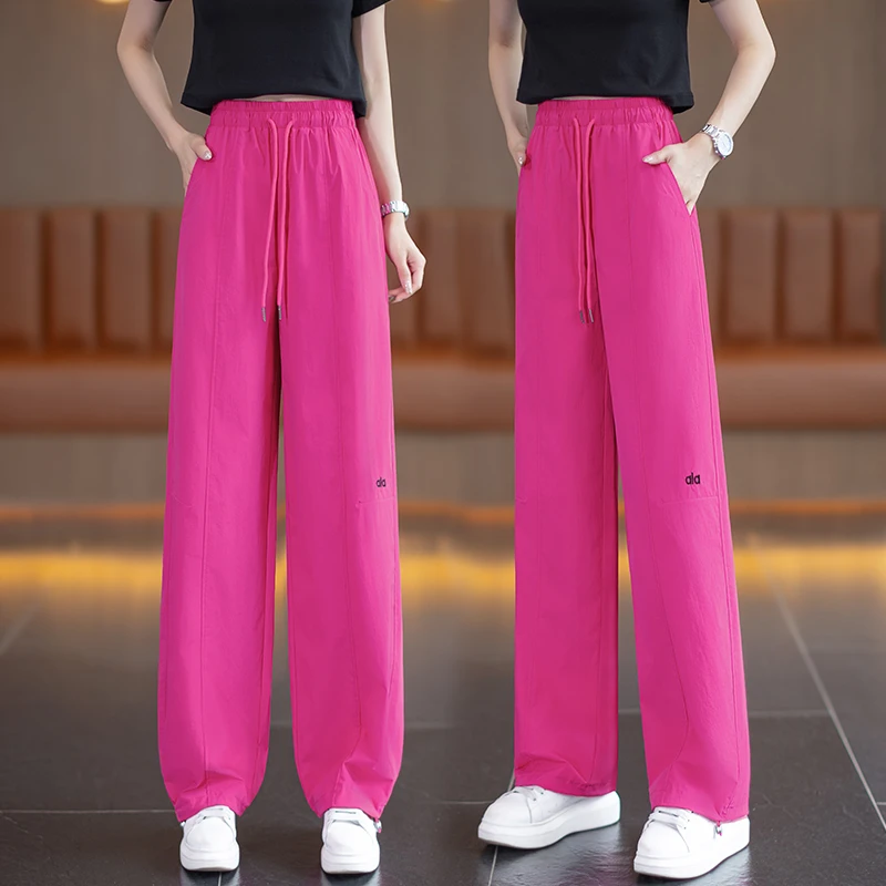 玫红色冰丝阔腿运动裤女2025夏薄款松紧腰束脚休闲裤子速干气球裤