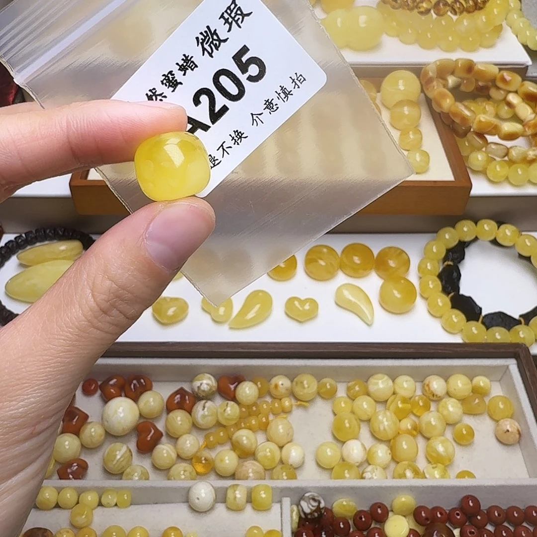 琥珀未镶嵌裸石205号，15.6mm