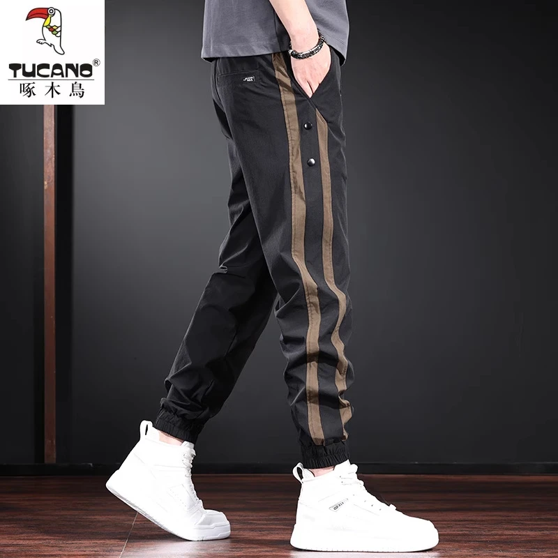 2025夏季薄款冰丝速干休闲裤男潮牌宽松运动裤条纹撞色凉感束脚裤