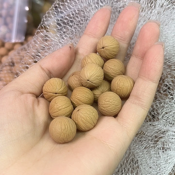 小***刻猴头核桃吊坠聚宝盆二级籽100颗