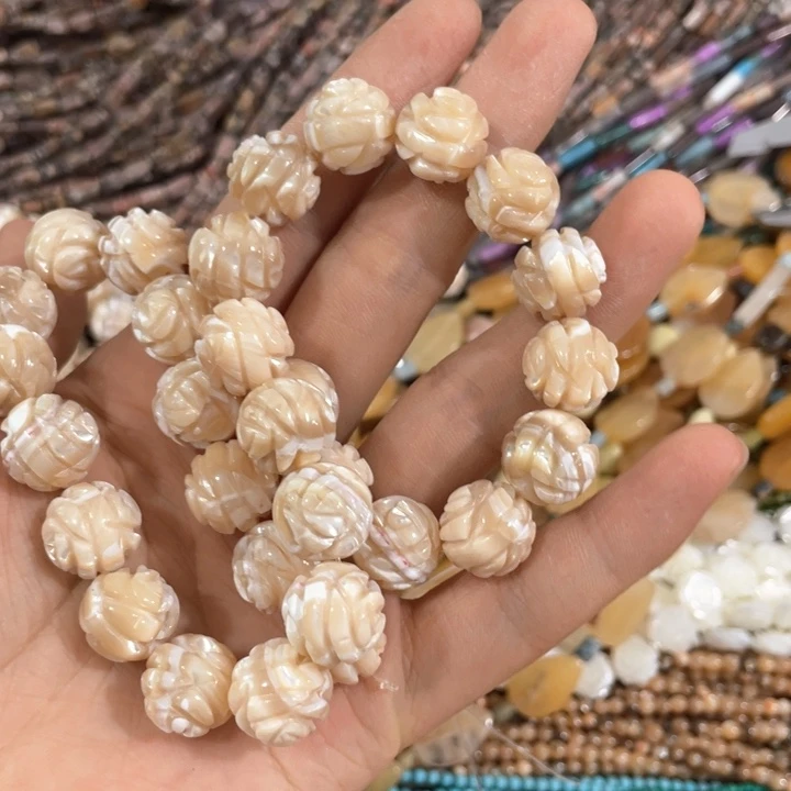 小***晓贝壳非金属一条12mm雕刻花打包