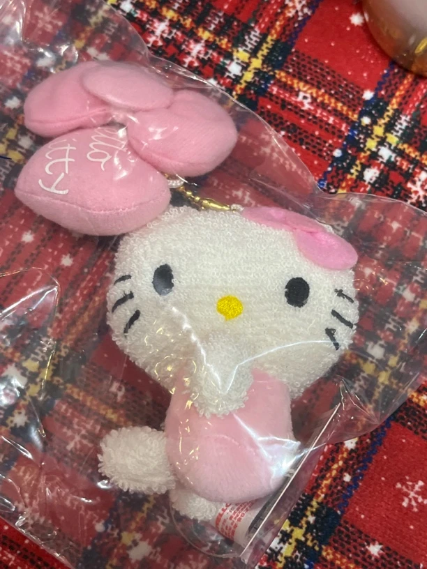 怎样专拍粉蝴蝶结kitty挂件