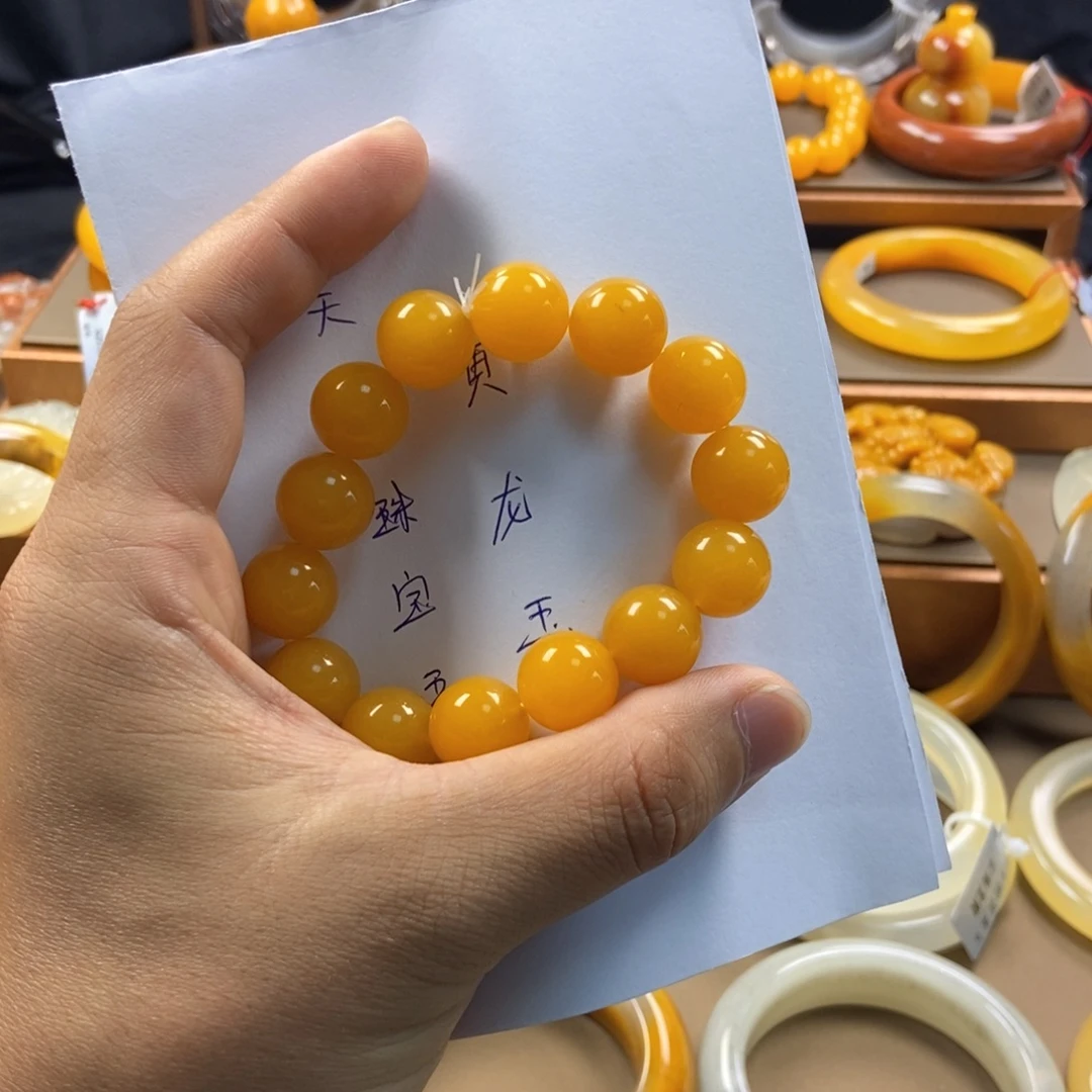 火***睛未镶嵌石英质玉（黄龙玉）手镯