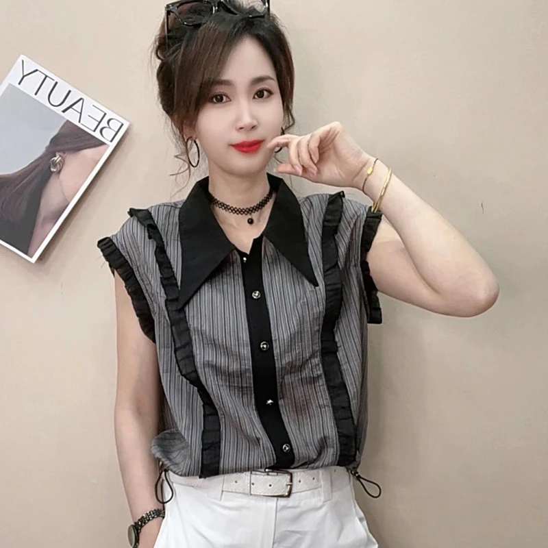 翻领纽扣衬衫女2025夏季新款时尚百搭洋气韩版蕾丝拼接慵懒风上衣