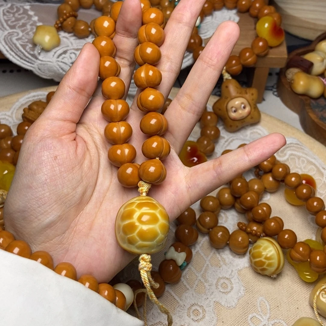 猴头核桃吊坠屁桃玻璃底卡14