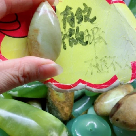 未镶嵌蛇纹石玉手把件