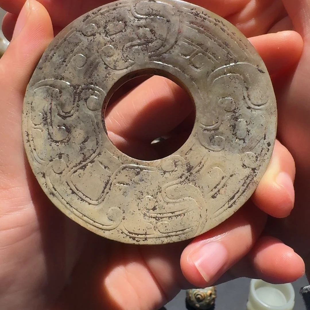 年***。和田玉未镶嵌挂件