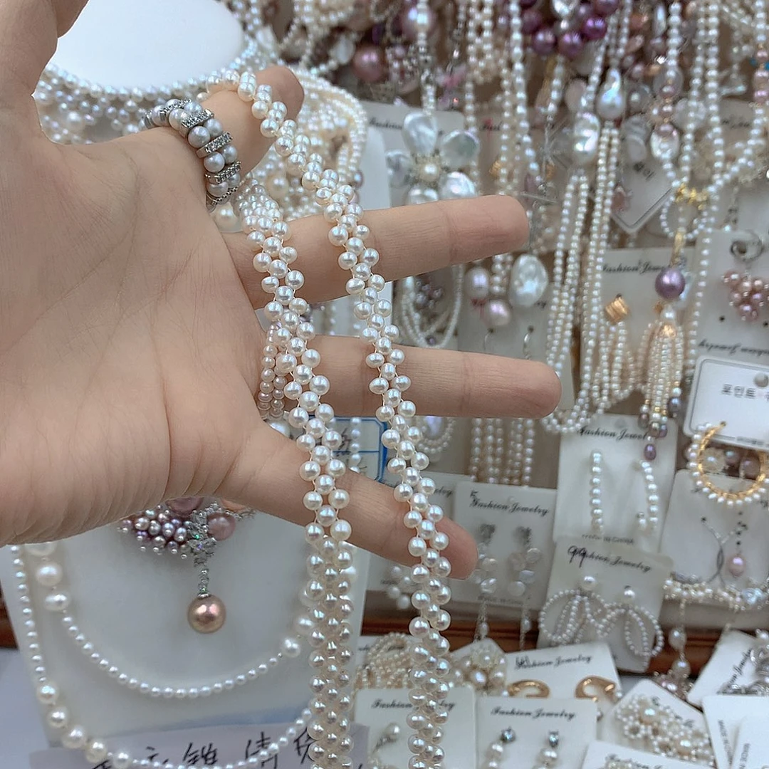 晨****淡水珍珠银S925镶嵌耳饰