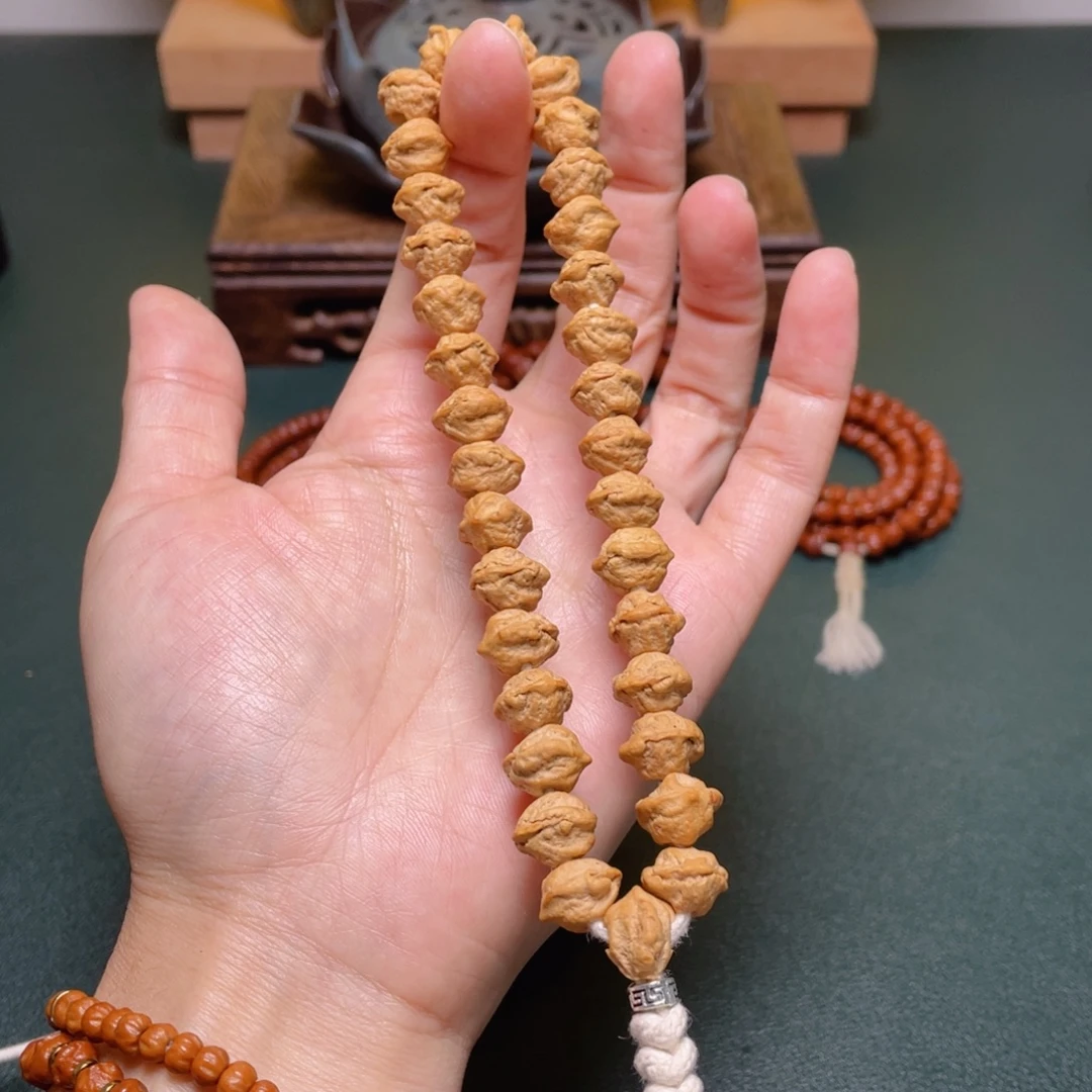 柏香籽/百香籽吊坠脸谱手持