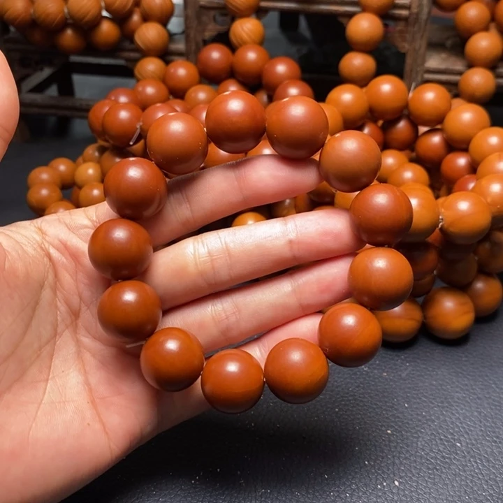 手串橄榄核1.75尺寸树王鸡血红光珠