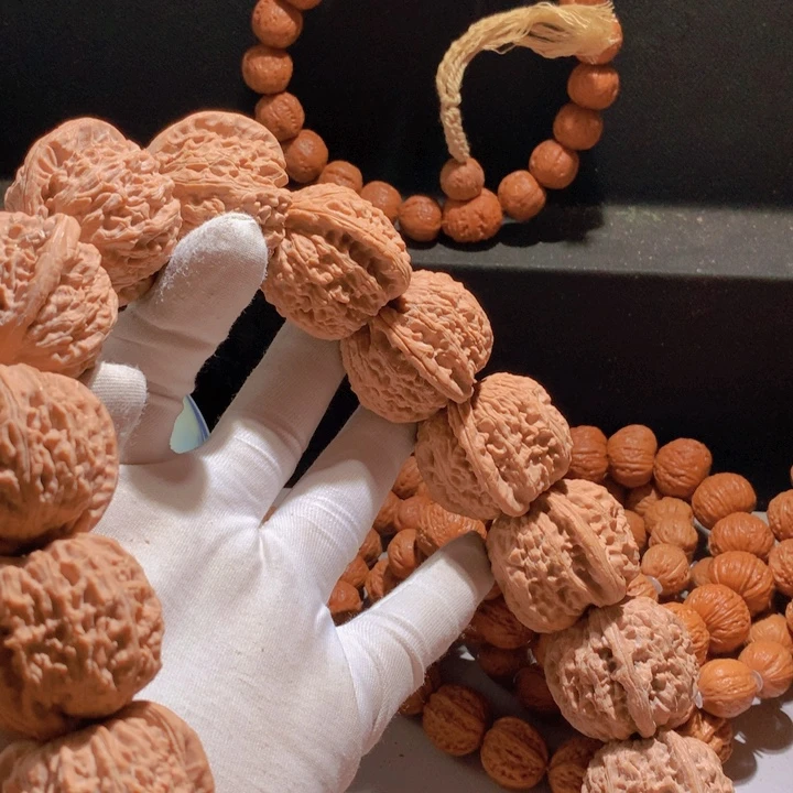 合***乐手串文玩核桃白狮子