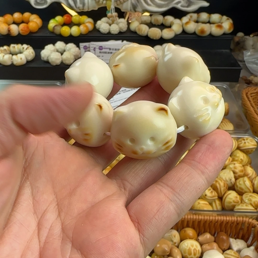 手串菩提根/象牙果微瑕炭烤海豹猫手捻1个