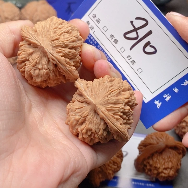 把件桃核?****42四座楼810号牌
