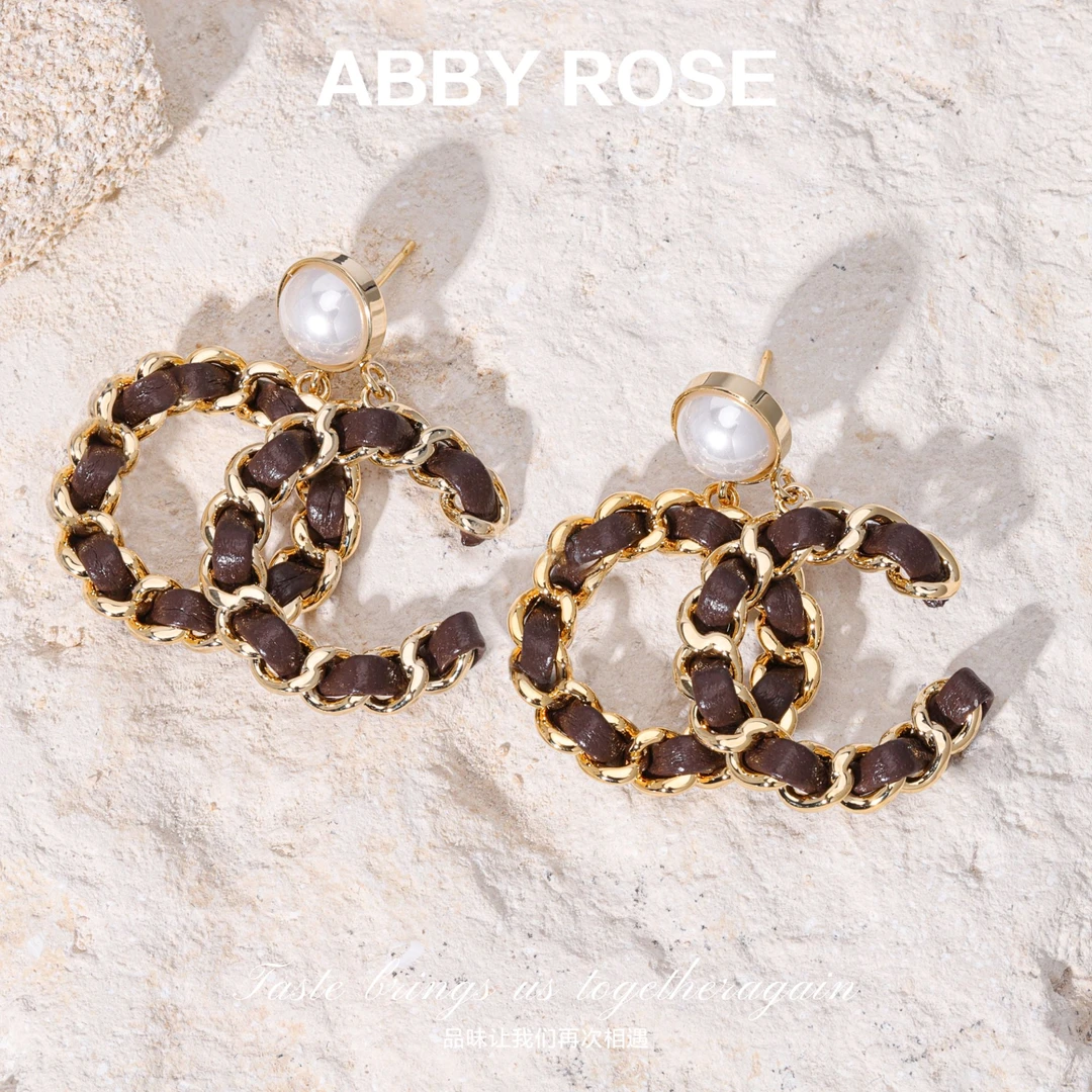 铜合金仿珍珠耳饰 ABBY ROSE轻奢小众设计感黑皮革耳环132B1