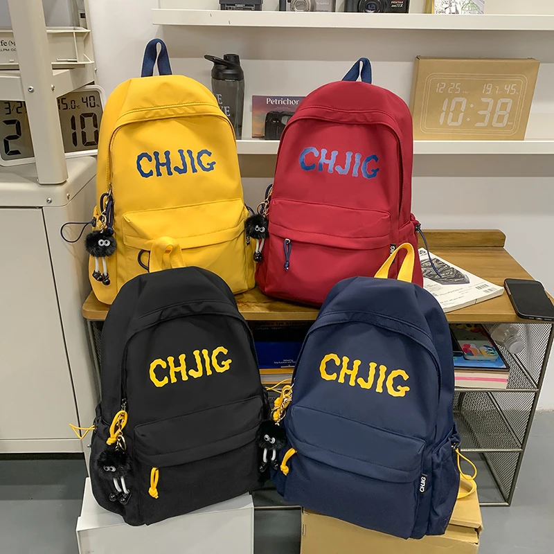 潮牌双肩包男初高中大学生轻便减负书包大容量简约百搭旅行背包女