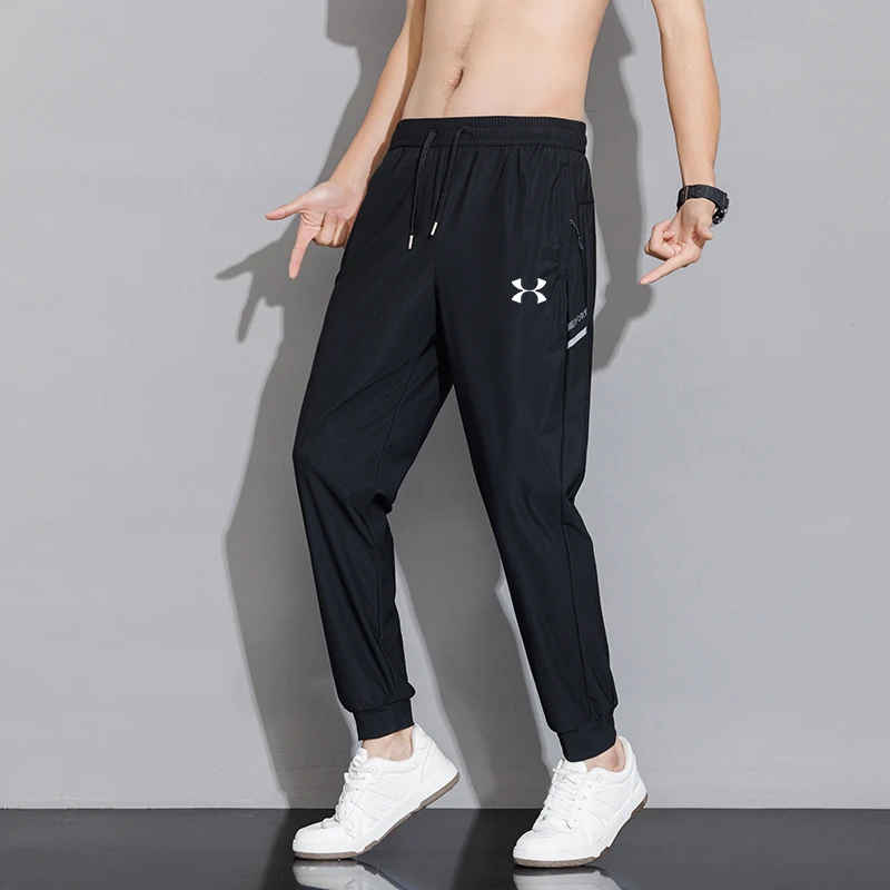 UA安德瑪冰丝裤男夏季运动裤薄款速干宽松休闲裤大码防晒跑步长裤