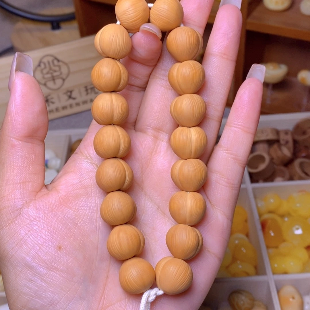 吊坠猴头核桃拉丝手持