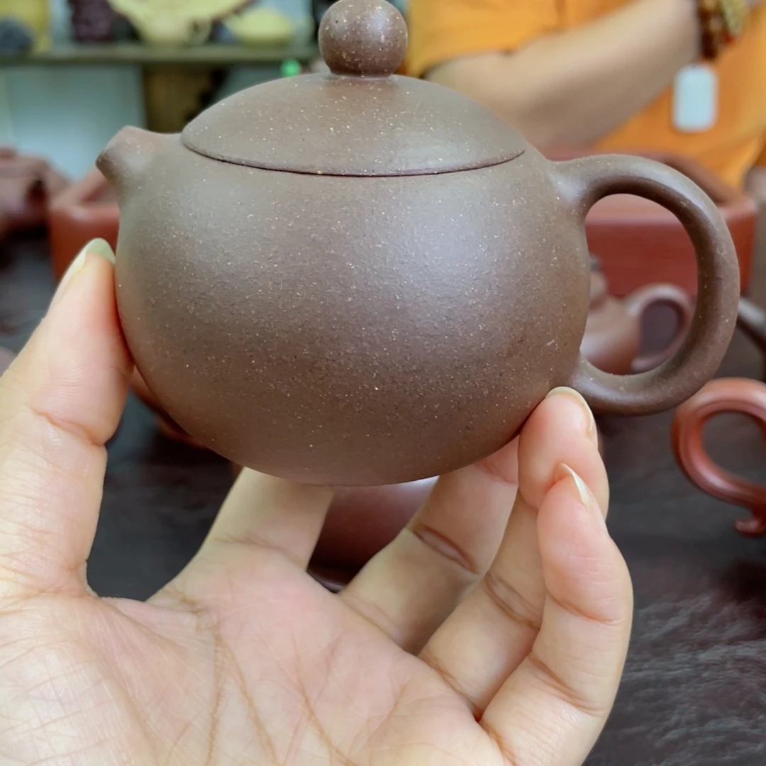 嘚***瑟茶壶紫砂西施。