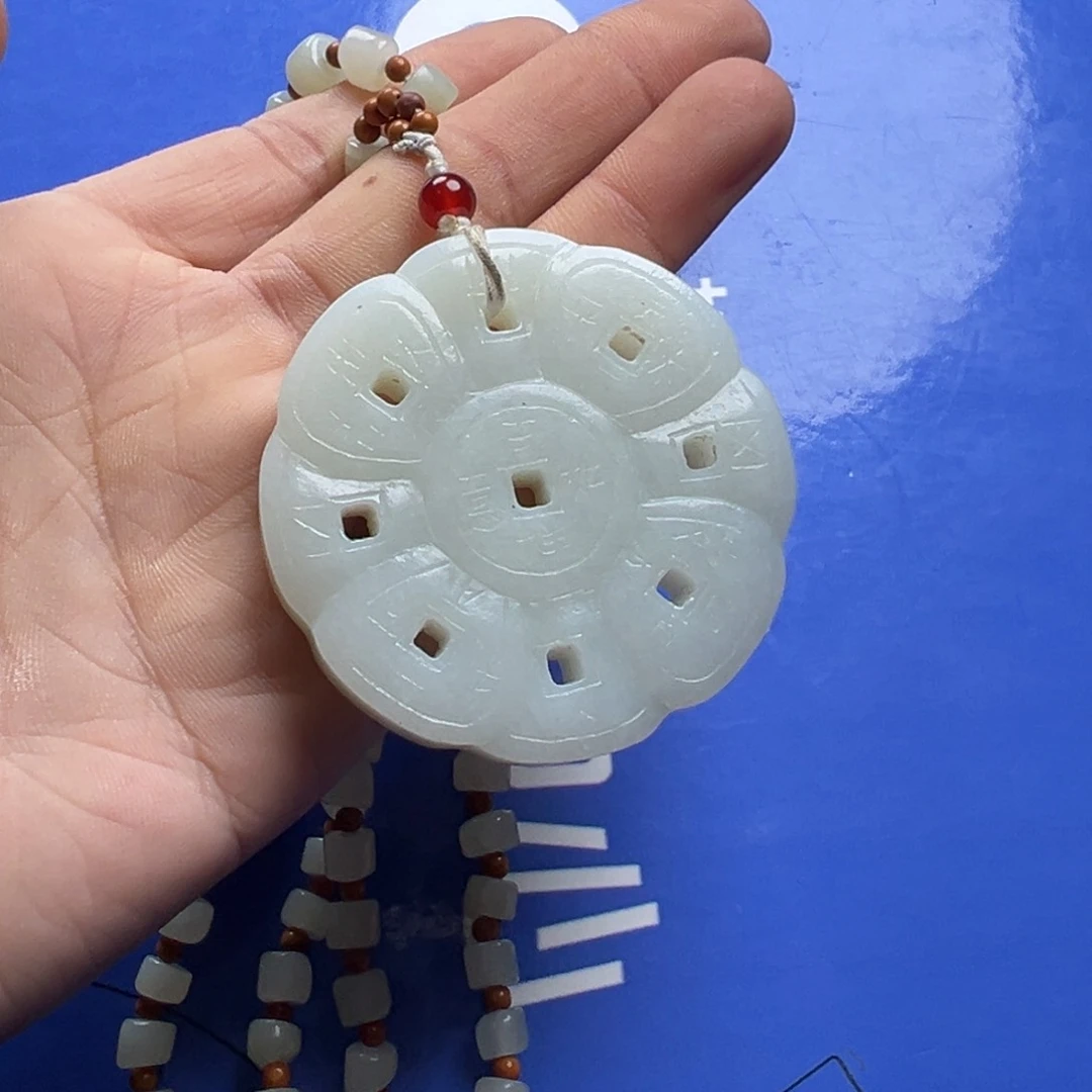 和田玉未镶嵌把件人**值