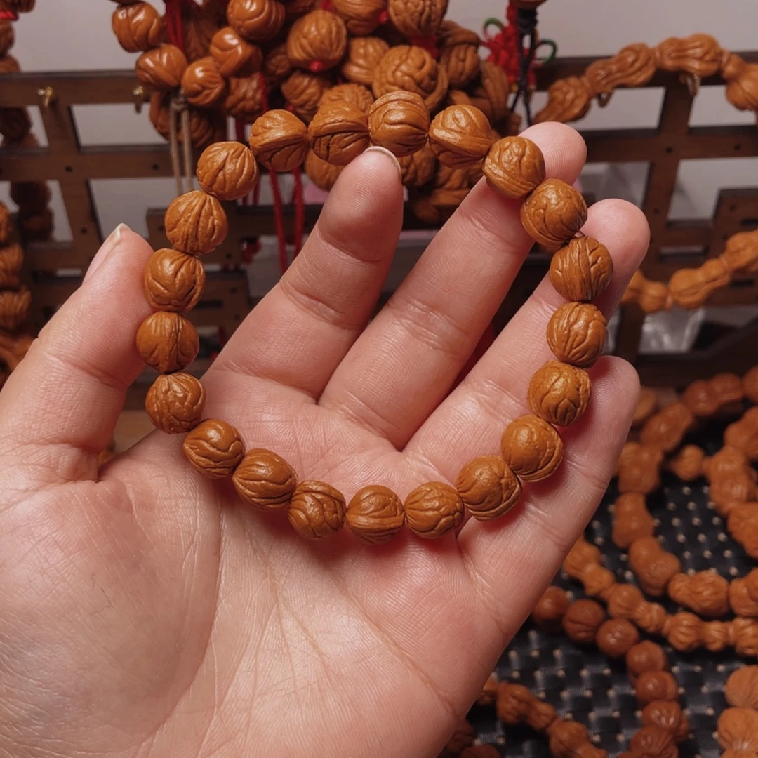 ༄***⁰木质类龙纹桃枭手串