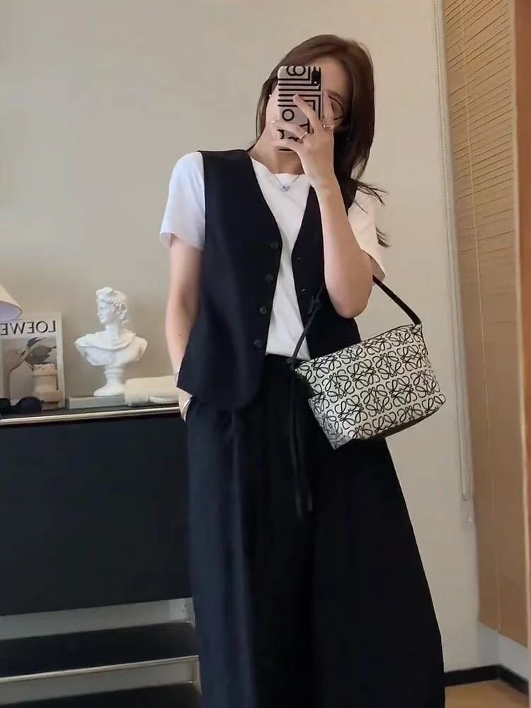 M胸100长50轻职风简约时尚无袖减龄休闲叠穿马夹上衣 9384