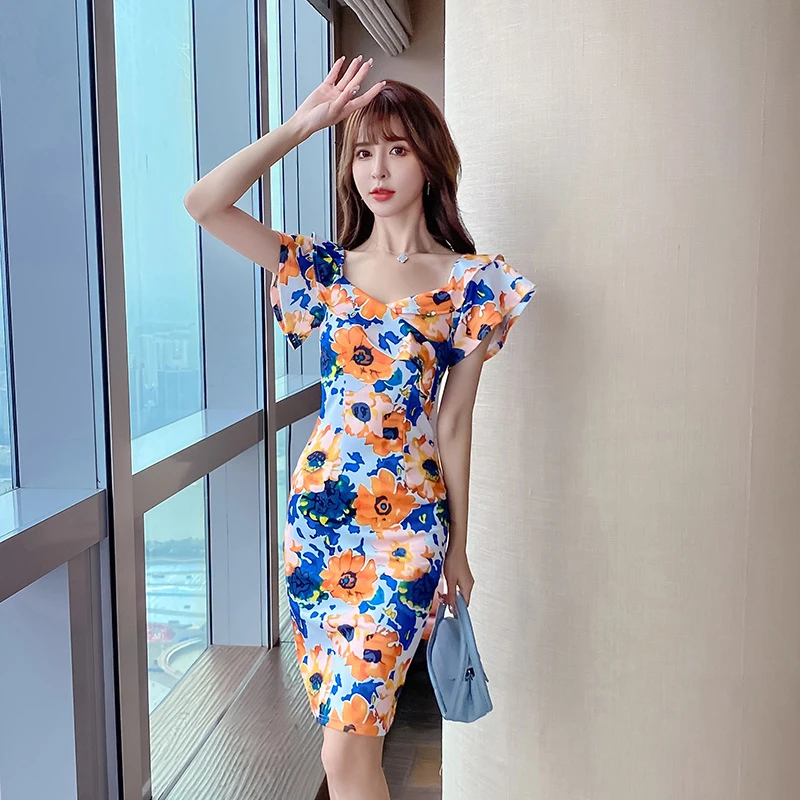 一字肩印花连衣裙夏季新款气质名媛女神范短袖修身显瘦包臀裙9394