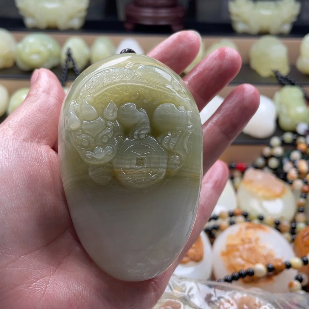 阿***章石材天然古青石手把件