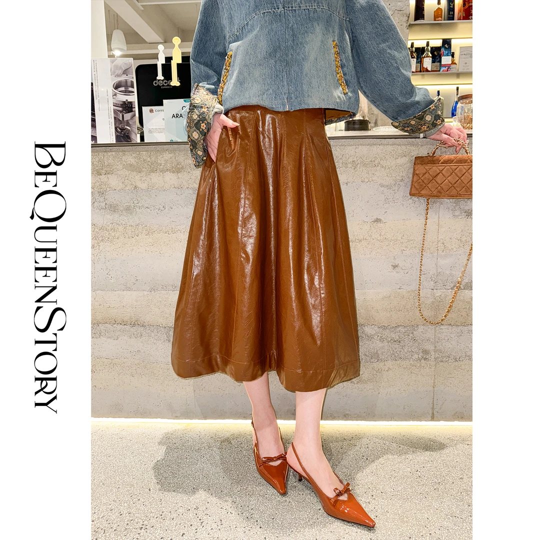 余潇潇【焦糖邂逅】遮肉藏胯腰头蕾丝花边拼接A字伞摆皮半裙早秋