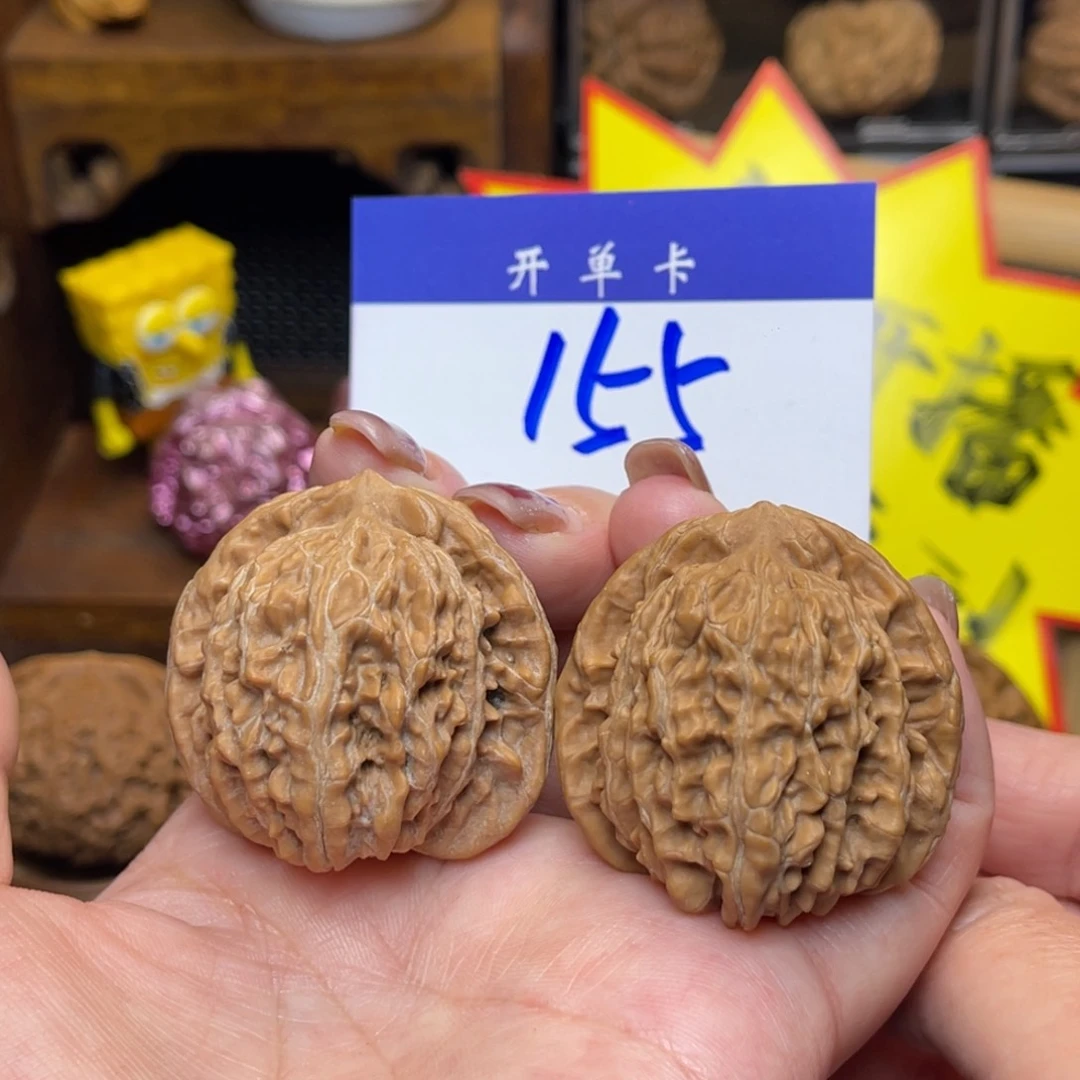 桃核把件平谷楼40李。
