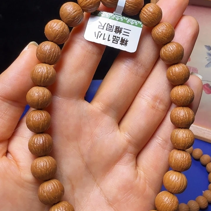 爱***哥吊坠猴头核桃凤羽