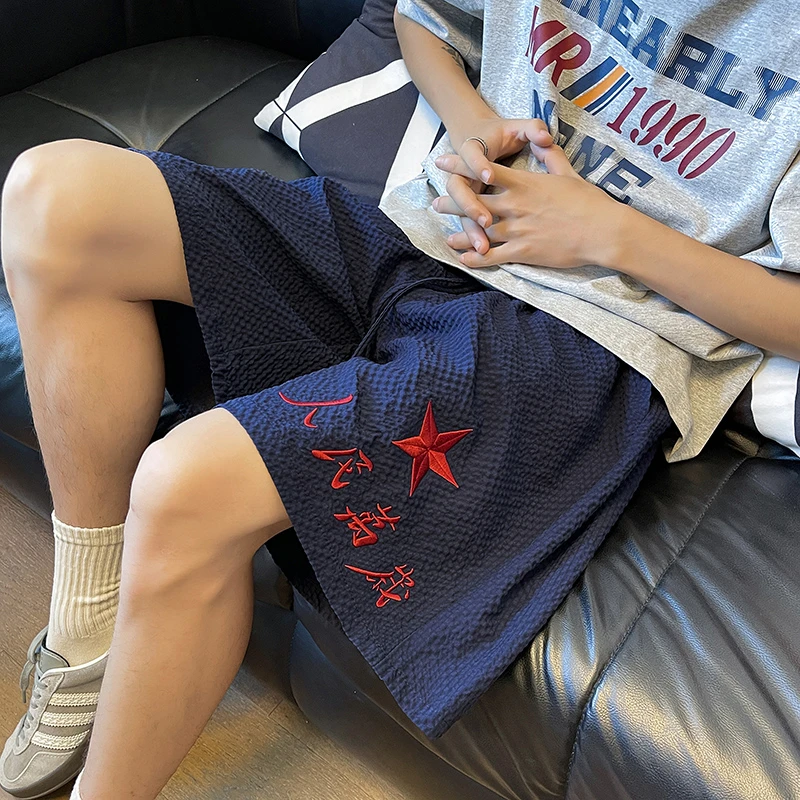 藏蓝色人民万岁刺绣短裤男款夏季泡泡纱裤子国潮运动速干五分中裤