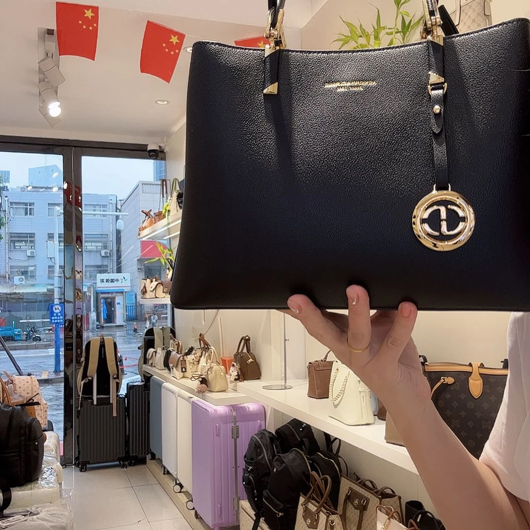 牛剖层皮革稻草人女包单肩手提包