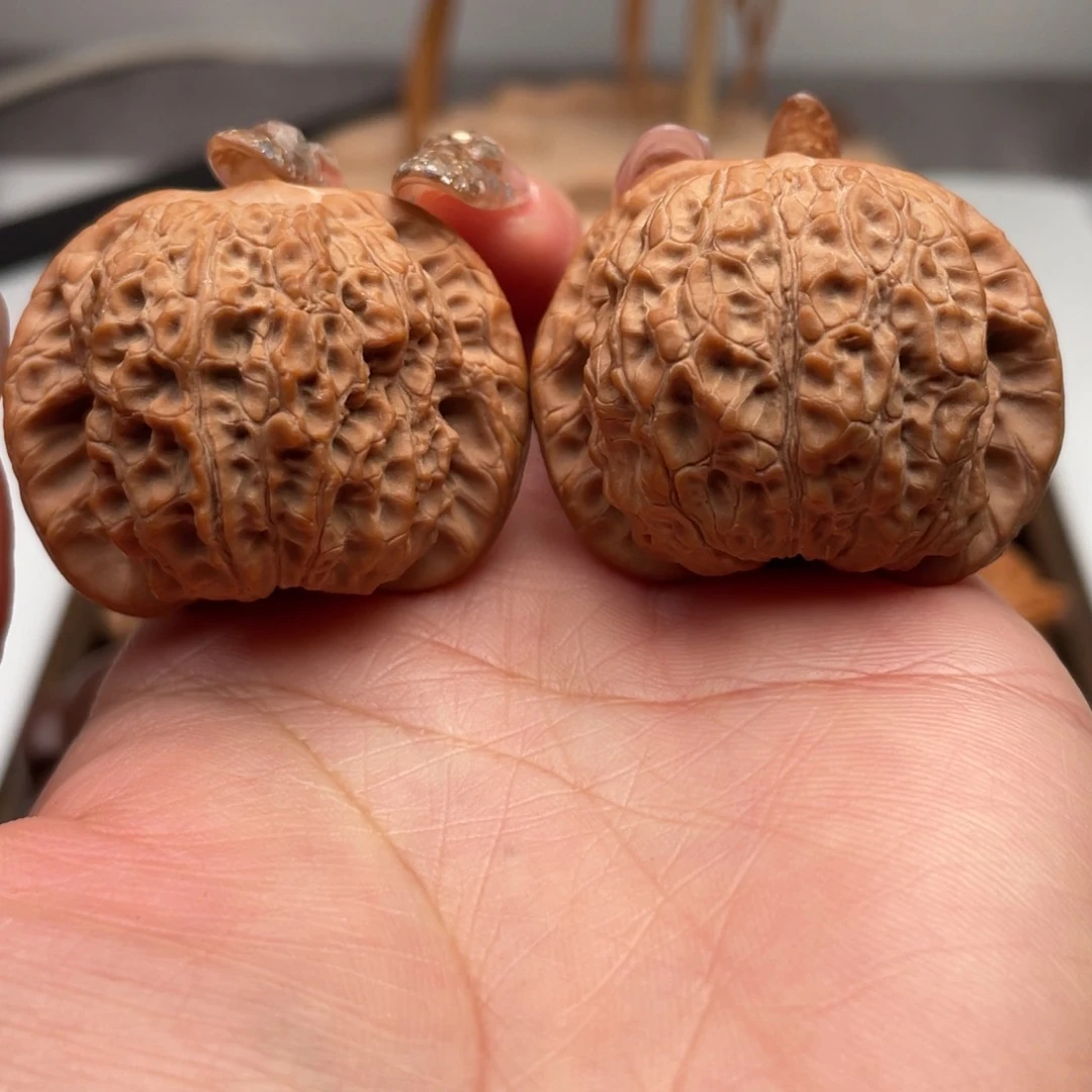 桃核把件T**g血麒麟全品40