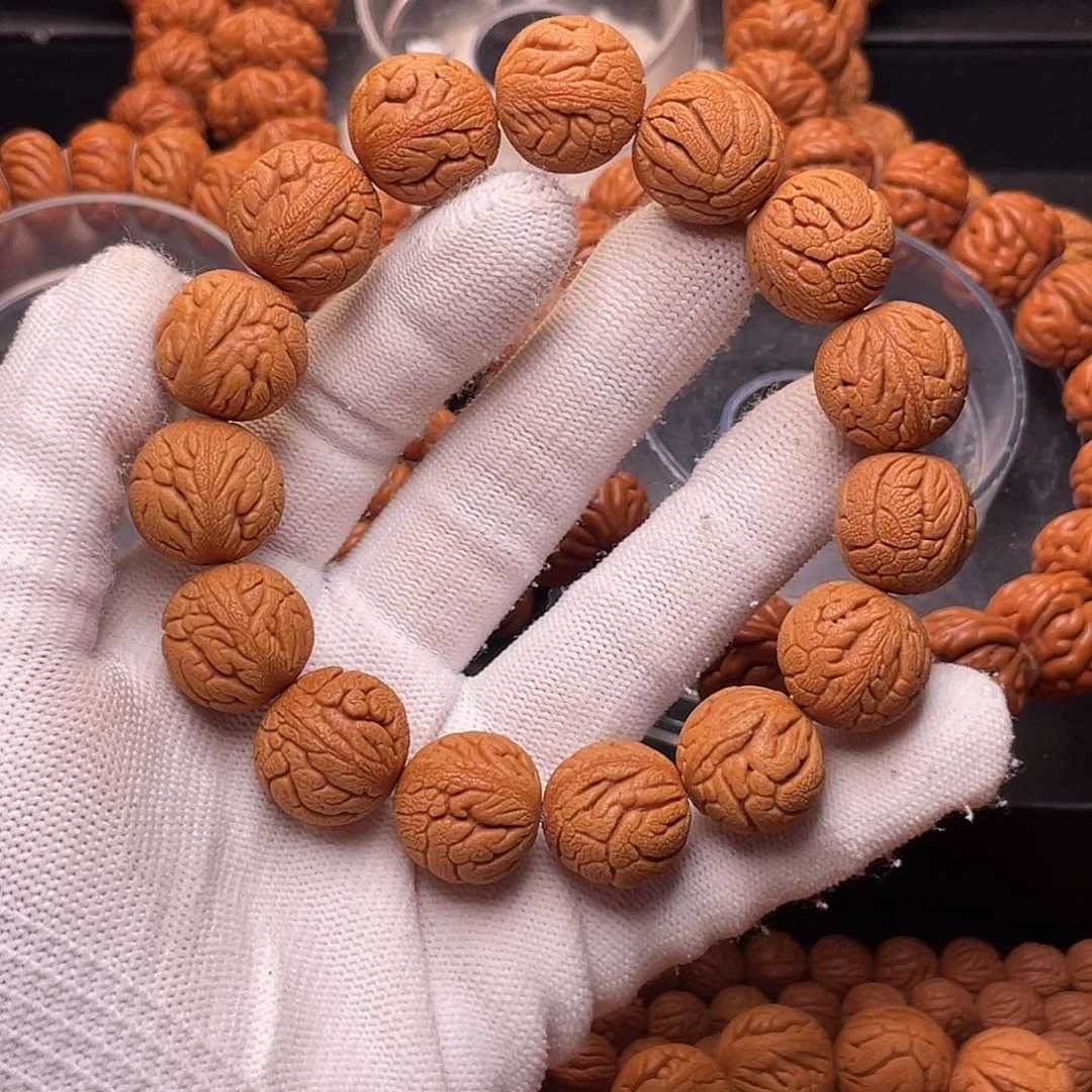 手串桃核金丝龙珠1.7