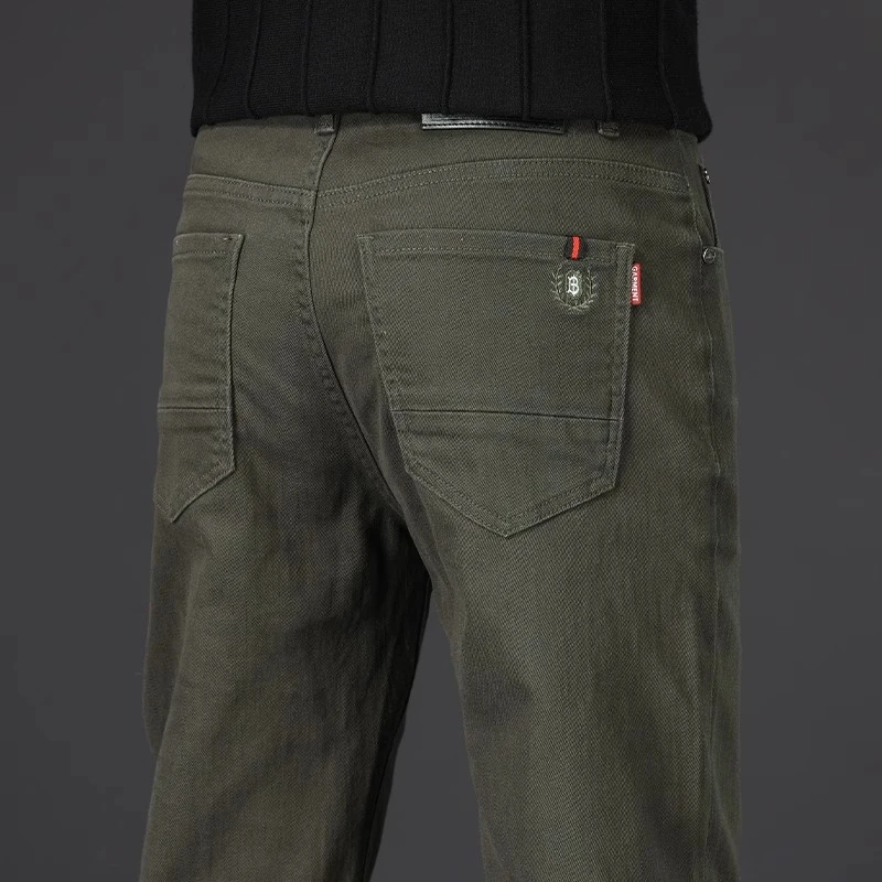 Leekody香港2025年军绿色牛仔裤男春季款修身弹力商务休闲长裤子