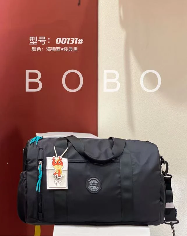 黑色纯色防水手提款旅行包户外轻便休闲肩包时尚经典多功能旅行袋
