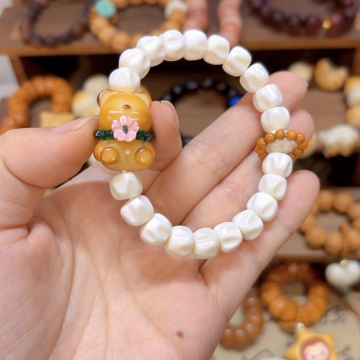 星月菩提手串驼骨百香籽10mm象牙果熊