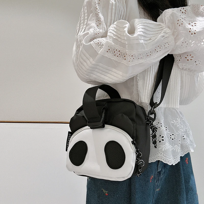 三色补丁黑眼圈熊猫挎包女冬季新款可爱少女心包包百搭小众单肩包