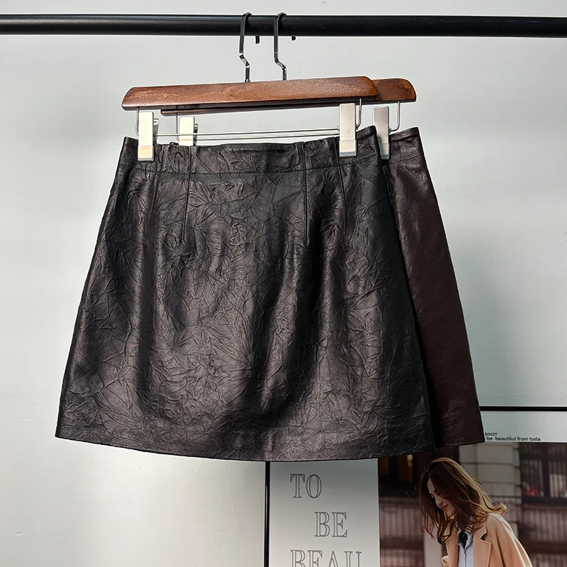 海宁2025秋冬新款抓皱真皮绵羊皮时尚百搭显瘦A字高腰短裙