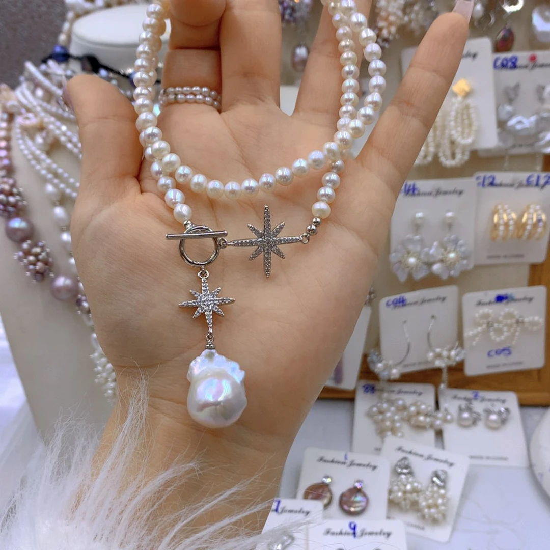 淡水珍珠耳饰。银S925镶嵌