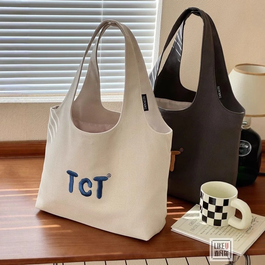 原创设计韩版文艺字母刺绣通勤帆布单肩腋下包休闲百搭学生托特包