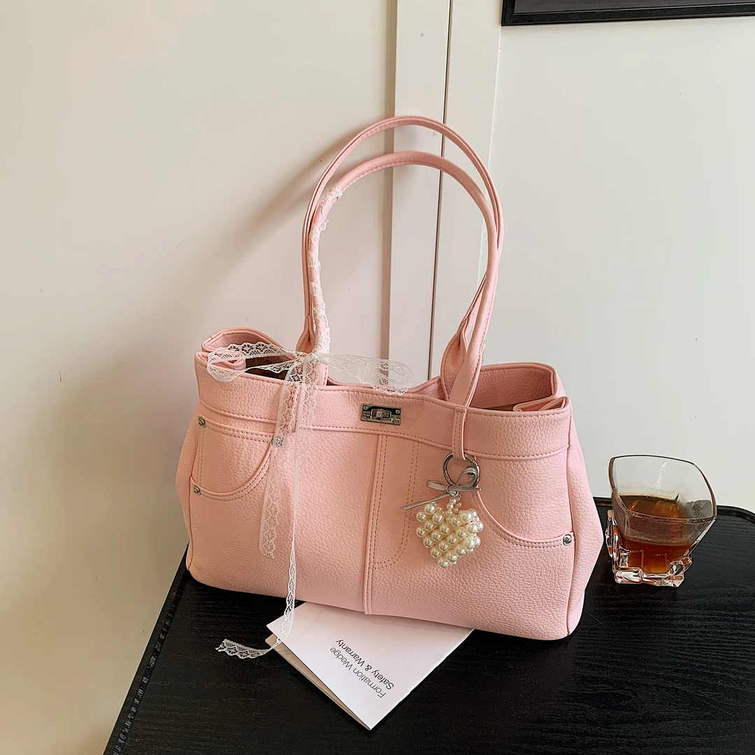 新款2025耐刮锁扣单肩单肩包休闲时尚白色肩包女士水桶包轻奢百搭