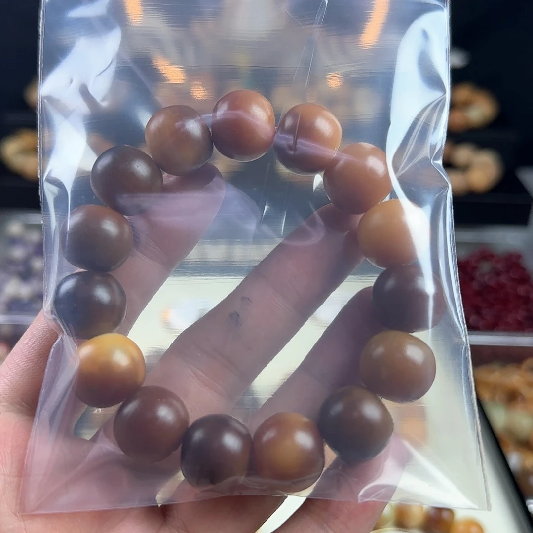 菩提根/象牙果手串工***队瑕疵卡16手串苹果