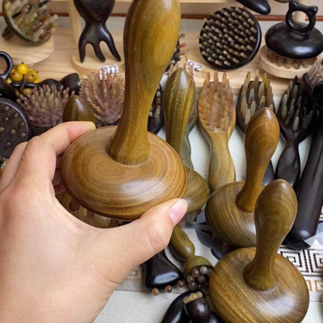 瑕疵绿檀按摩梳辫子